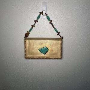 Elegant Gold Mini Bag with Turquoise Accent